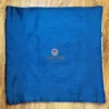 Back view of Floral Harmony Dual-Tone Cushion Cover, solid blue reverse side for versatile home styling
