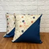 Pair of Floral Harmony Dual-Tone Cushion Covers, blue and white with embroidered floral design, perfect for living area