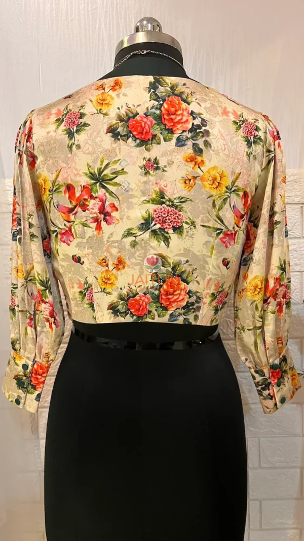 Rear view of Blossom Elegance Floral Blouse with vivid flower print and graceful shaping