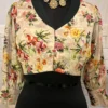 Blossom Elegance Floral Blouse front view with vibrant flower print and elegant neckline