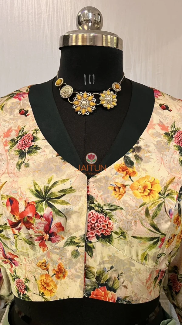 Closeup of neckline and vibrant floral print on Blossom Elegance Floral Blouse