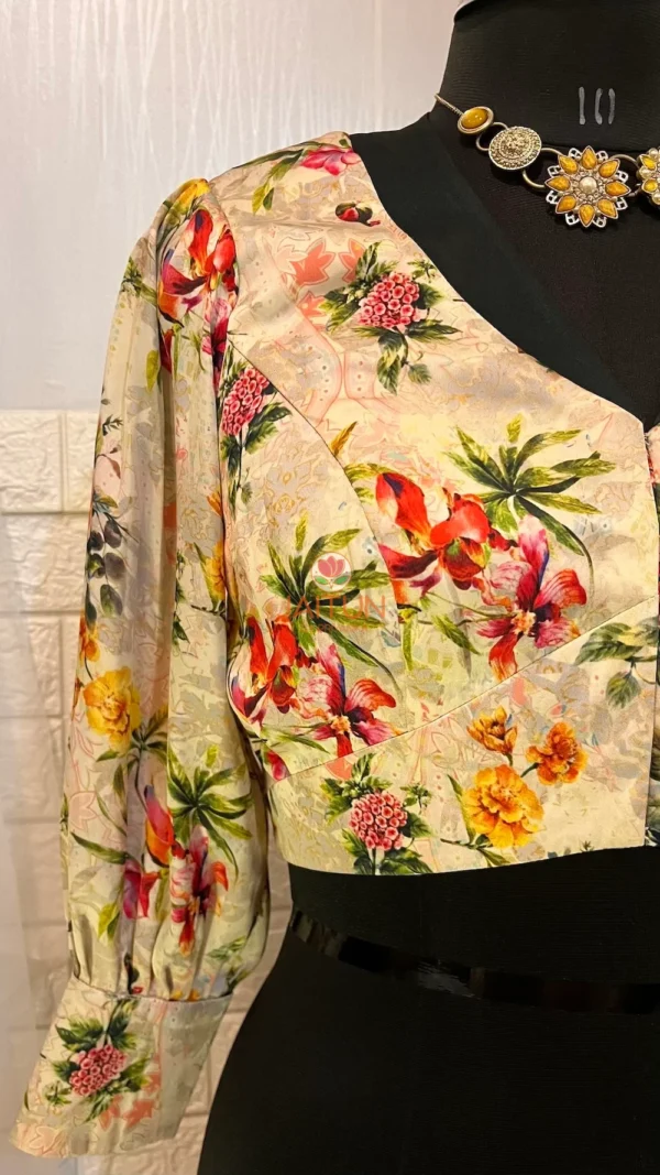 Sleeve detail of Blossom Elegance Floral Blouse highlighting beautiful flower patterns and cuff buttons