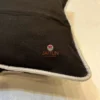 Back panel of Eclipse Polka Dot Cushion Cover, premium black fabric and piping detail