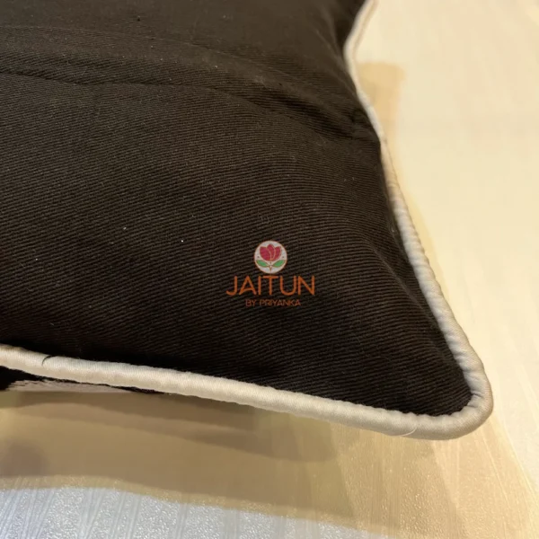 Back panel of Eclipse Polka Dot Cushion Cover, premium black fabric and piping detail