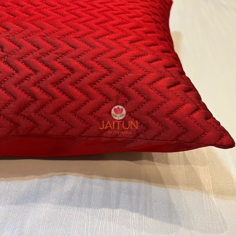Side close-up of Elegant Chevron Red Cushion Cover, vivid red cushion with detailed chevron quilting