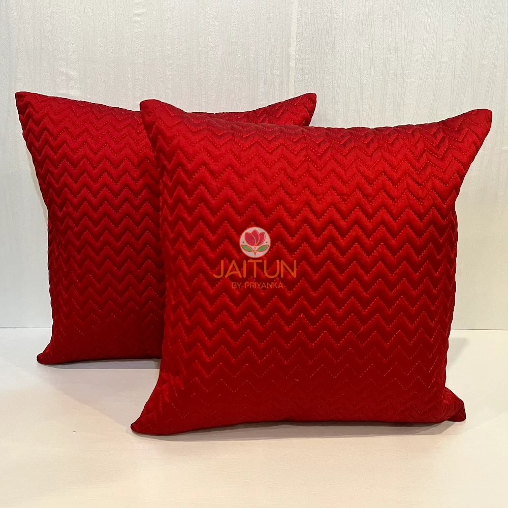 Display of Elegant Chevron Red Cushion Covers, set of two, plush quilting for luxury sofa styling