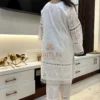 Back view of Elegant White Cotton Shifli Suit Set showcasing all-over shifli embroidery and lace finishing