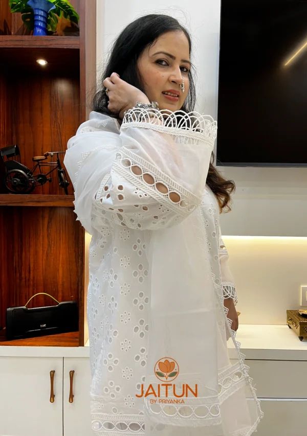 Close-up showing the sheer dupatta and lace accents of the Elegant White Cotton Shifli Suit Set