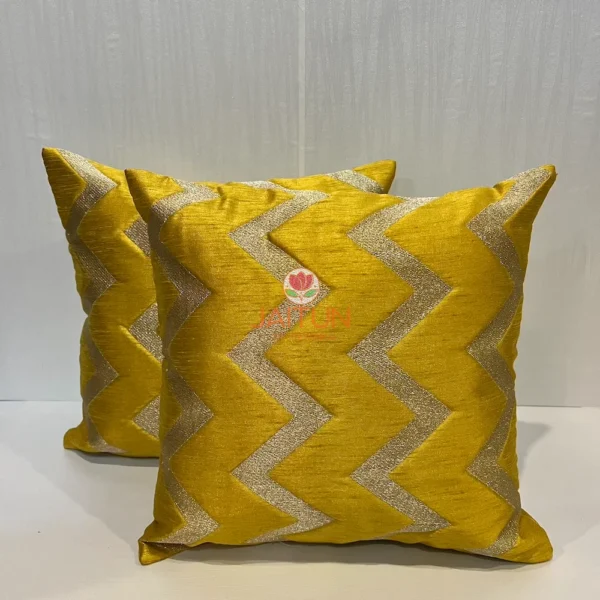 Front view of two Yellow Chevron Luxe Throw Cushions with metallic zigzag pattern, elegant décor accent