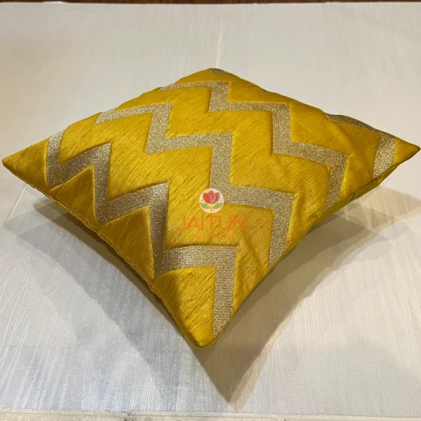 Yellow Chevron Luxe Cushion shown in side angle, highlighting the shine and texture of the chevron pattern