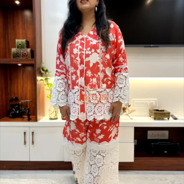 Front view of Coral Floral Co-Ord Set with bold white lace detailing and vibrant coral floral print
