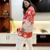 Side profile view of Coral Floral Co-Ord Set featuring white lace accents and floral design