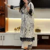 Full view of Elegant Floral Embroidered Kurta & Pant Suit Set with black floral embroidery and lace accent on beige fabric