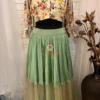 Front view of Enchanted Meadow Tulle Maxi Skirt Lehenga featuring soft green hues and embroidered tulle overlay