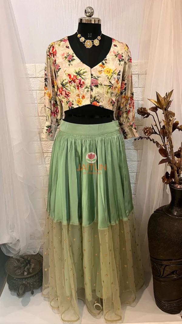 Front view of Enchanted Meadow Tulle Maxi Skirt Lehenga featuring soft green hues and embroidered tulle overlay