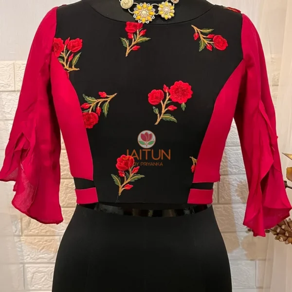 Floral Fantasy Ruffle Sleeve Crop Blouse with black base, vibrant red floral embroidery, and statement ruffle sleeves