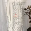 Angled front display of Geometric Elegance Straight Dress showcasing its innovative asymmetrical one-sleeve style, silver geometric pattern, and tailored fit for chic Kurti ensembles.