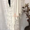 Full display of Geometric Elegance Straight Dress on mannequin, highlighting the pure white crepe fabric, statement geometric print, and asymmetrical sleeve design.