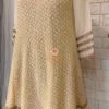 Sleeve detail of Golden Grace Embellished Kurta highlighting gold thread embroidery, geometric borders, and elegant craftsmanship for party wear Kurti styles.