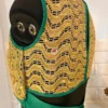 Detailed golden embroidery on teal green silk blouse with luxe threadwork and sequins