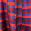 Closeup of multicolor striped fabric on the Vibrant Vogue Lehenga Skirt
