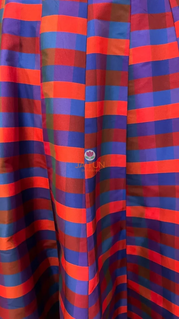 Closeup of multicolor striped fabric on the Vibrant Vogue Lehenga Skirt