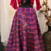 Front view of Vibrant Vogue Striped Maxi Skirt Lehenga featuring bold multicolour stripes and embroidered blouse