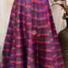 Full skirt detail of the Vibrant Vogue Lehenga set with bold red and blue stripes