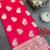 Crimson Bloom Banarasi Silk Saree flatlay with gold floral motifs and intricate zari border, paired with red bangles and traditional jewelry
