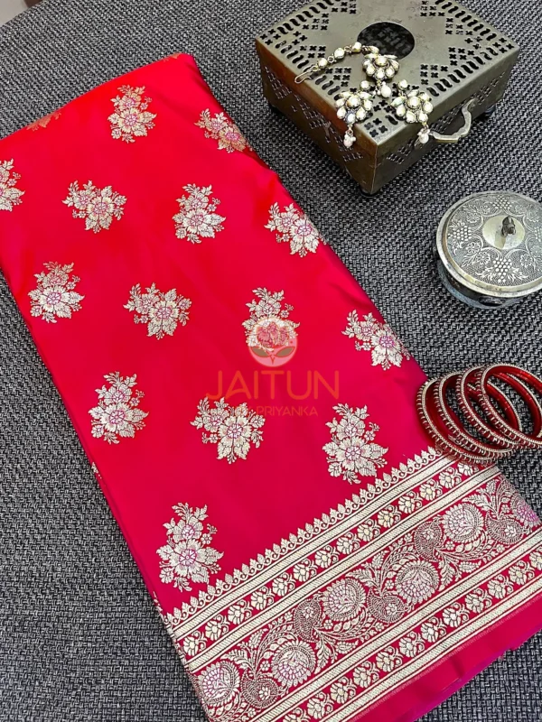 Detailed view of Crimson Bloom Banarasi Silk Saree showcasing gold zari floral patterns and traditional border design