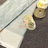 Elegant Grey Banarasi Silk Saree flatlay featuring delicate silver zari motifs, classic chevron border, and contemporary styling with gold bangles