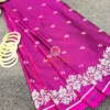 Detailed view of Magenta Grace Banarasi Silk Saree showing silver zari floral motifs and classic border design