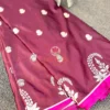 Mulberry Grace Silk Saree displaying all-over white floral motifs and elegant silk texture with intricate weaving