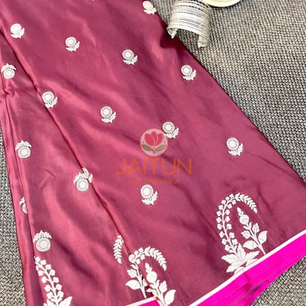 Mulberry Grace Silk Saree styled with stacked silver bangles and decor, highlighting floral embroidered border and rich silk finish