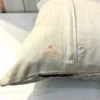Back view of abstract brushstroke suede velvet embroidered cushion cover with zip closure