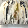 Detailed close-up of brushstroke embroidery on suede velvet cushion cover