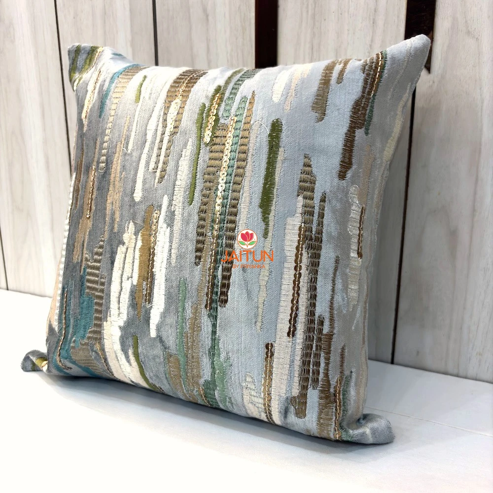 Silver Sage Abstract Embroidered Velvet Cushion Cover – Angled View Angled view of Silver Sage Abstract Embroidered Velvet Cushion Cover with abstract brushstroke pattern and elegant detailing
