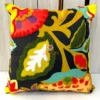 Closeup of Boho Garden appliqué cushion cover highlighting detailed stitching