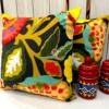Side angle of Boho Garden cushion cover showing multidimensional embroidery