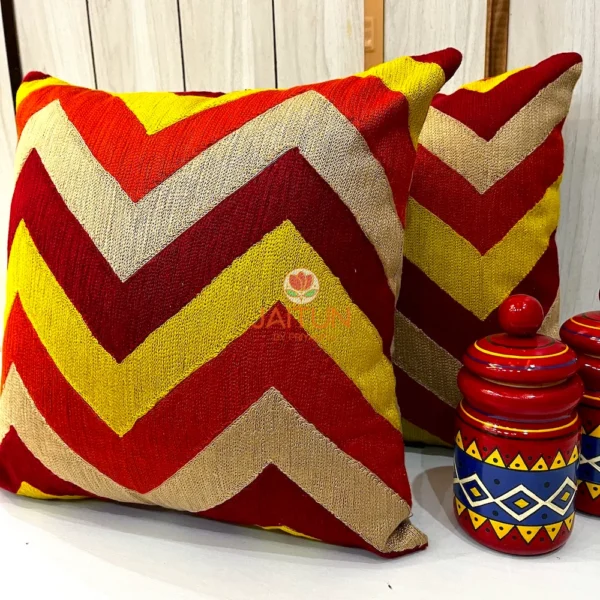 Set of Fiery Chevron Handwoven Cushion Covers Styled on Sofa - Vibrant Red and Yellow Chevron Pattern