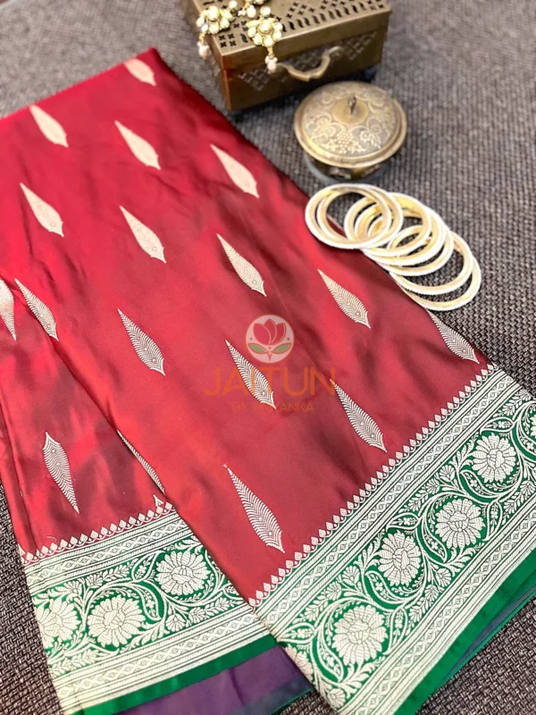 Detail view of Gulnaar Maroon Silk Saree showing classic Banarasi gold motifs and intricate floral zari border