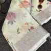 Detailed view of Pastel Bloom Banarasi Printed Kota Silk Saree highlighting delicate pink and yellow floral patterns with ornate silver border