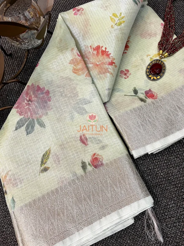 Pastel Bloom Banarasi Kota Silk Saree styled with statement necklace, highlighting multi colour floral print and intricate silver border