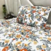 Autumn Garden Bloom bed sheet set styled in a bedroom setup, showcasing full floral layout and pillow covers