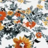 Autumn Garden Bloom bed sheet set closeup highlighting bold orange and yellow floral pattern with leafy accents