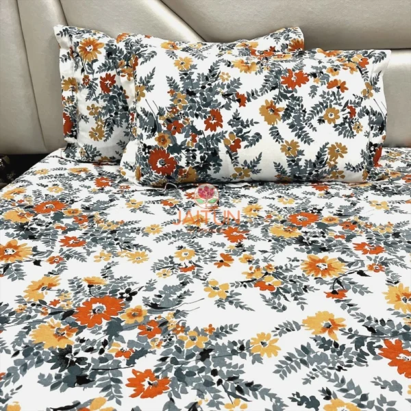 Autumn Garden Bloom bed sheet set showing pillow detail with orange and yellow flowers on white background