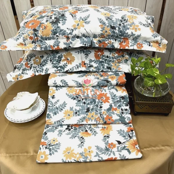 Stacked view of the Autumn Garden Bloom bed sheet set showing detailed leaf and flower prints in warm autumn tones