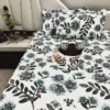 Bedroom view of Azure Bloom Botanical Cotton Bedsheet Set, displayed with pillow covers and tray, highlighting vibrant floral print.