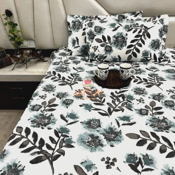 Bedroom view of Azure Bloom Botanical Cotton Bedsheet Set, displayed with pillow covers and tray, highlighting vibrant floral print.