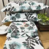 Azure Bloom Botanical Cotton Bedsheet Set showing closeup of blue and black botanical floral print on soft cotton fabric.